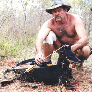 The author with a black pure-bred dingo from North Queensland.
